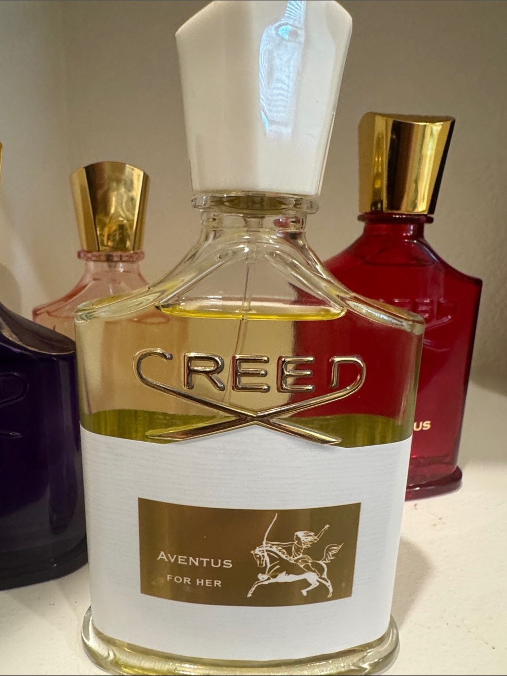 Creed Aventus for Her White & Gold Fragrance Bottle